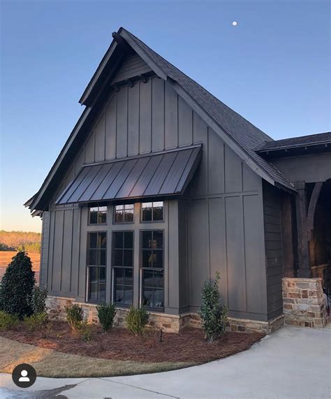 metal roof house black combinations with flashing and gutter|black metal exterior designs.